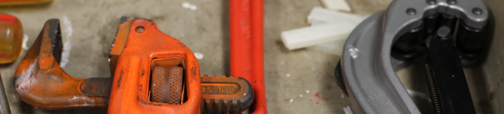 Pipefitters orange wrench and tools